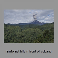 rainforest hills in front of volcano
